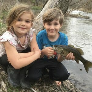Kids catching fish on the French Broad River in Hot Springs North Carolina