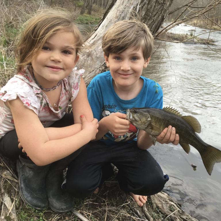 Kids catching fish on the French Broad River in Hot Springs North