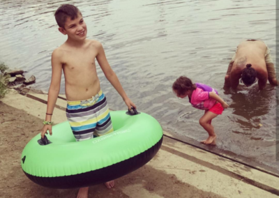 Tubing and Playing in the French Broad River near Asheville in Hot Springs NC